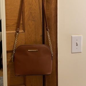 Steve Madden purse in good used condition. 2 scuff marks showed.